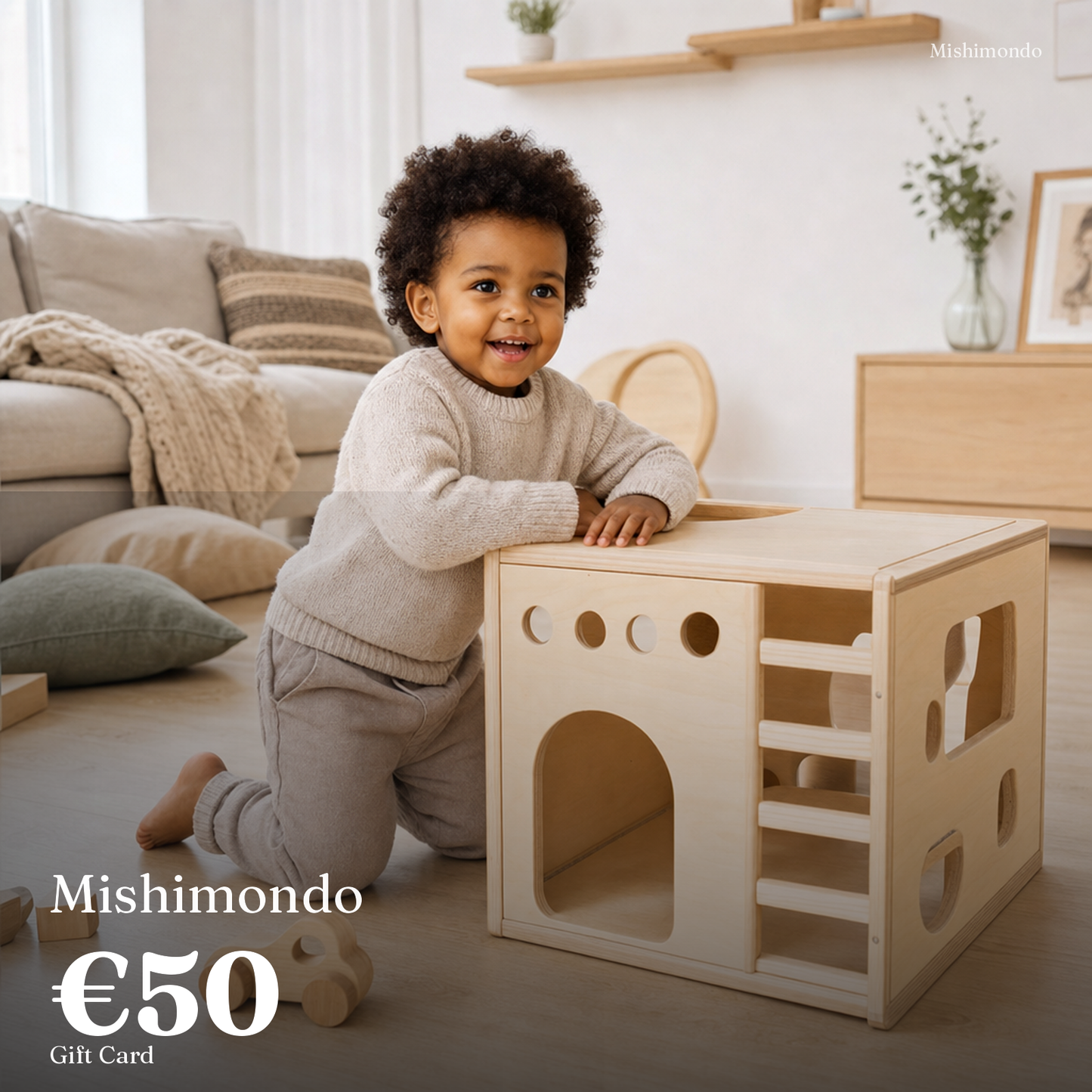 Mishimondo €50 gift card — child with climbing cube in a lived-in home